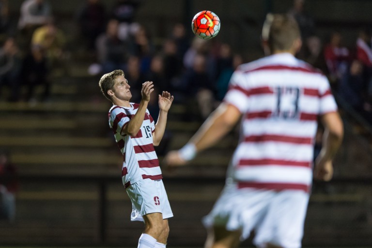 Eric Verso (left) netted the game-winner in overtime against SMU to extend Stanford's win streak to five. The Mustangs were the first team to score against the Cardinal since their home-opener. (JIM SHORIN/stanfordphoto.com)