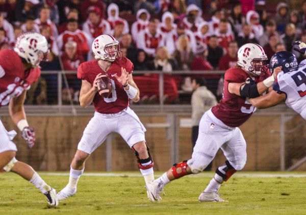 After a rocky start to the 2015 campaign, Kevin Hogan (middle) led the Cardinal to the No. 3 spot in the final AP poll. (KEVIN HSU/The Stanford Daily)