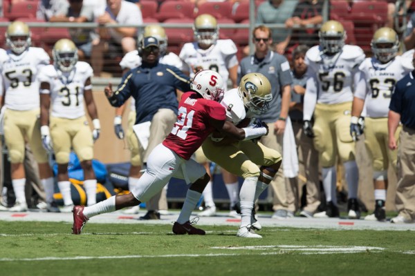 Senior cornerback Ronnie Harris (left) leads a Stanford defense that is second in the Pac-12 in total defense and ranks close to the top in nearly every defensive category. (FRANK CHEN/The Stanford Daily)