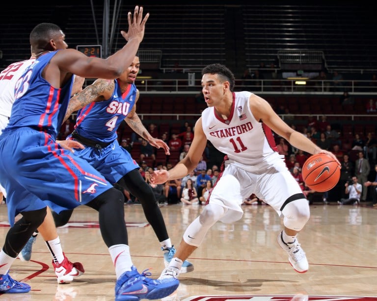 In a tough 14-point loss to No. 8 Villanova, the performance of Dorian Pickens (right) was a highlight for the Cardinal, as the sophomore recorded his first career double-double with 11 points and 10 rebounds. (BOB DREBIN/isiphotos.com)