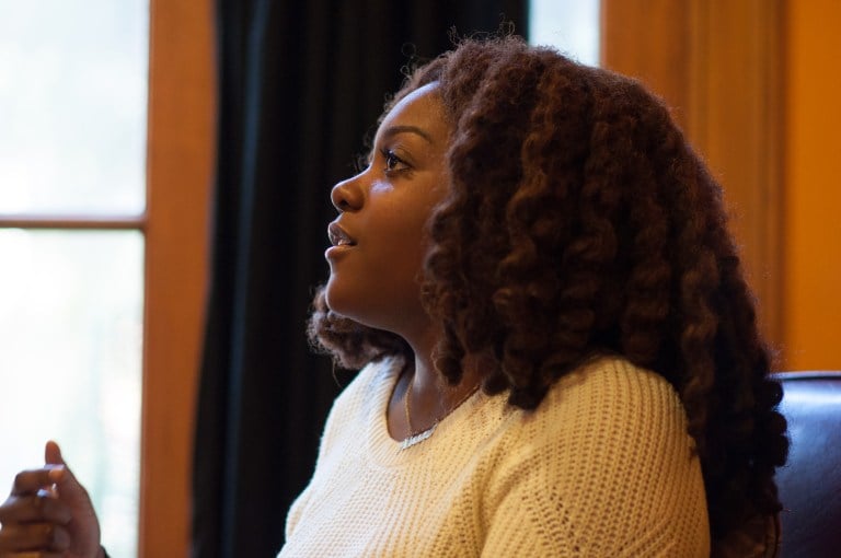 Noname Gypsy speaking at the Harmony House during a Q&A hosted by IDA. (RAHIM ULLAH/The Stanford Daily)