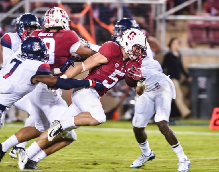 Sophomore running back Christian McCaffrey (center) has averaged 245 all-purpose yards per game. McCaffrey returns home to face a Colorado team that kept the ball for 41 minutes against UCLA. (KEVIN HSU/The Stanford Daily)