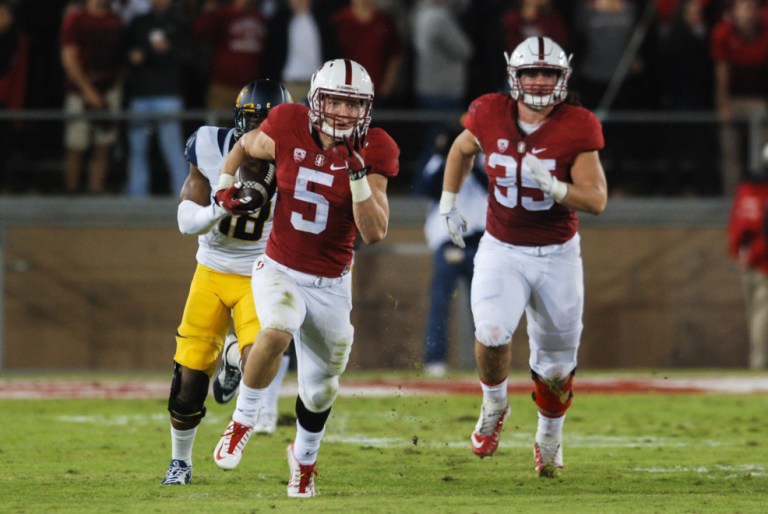 With his 389-yard all-purpose performance in the 118th Big Game, sophomore running back Christian McCaffrey (above) broke the old Stanford record set by Glyn Milburn almost exactly 25 years ago, in the 1990 Big Game. McCaffrey's big day spurred Stanford to a Big Game win and a Pac-12 North title. (SAM GIRVIN/The Stanford Daily)