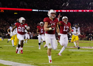 With his 389-yard all-purpose performance in the 118th Big Game, sophomore running back Christian McCaffrey (above) broke the old Stanford record set by Glyn Milburn almost exactly 25 years ago, in the 1990 Big Game. McCaffrey's big day spurred Stanford to a Big Game win and a Pac-12 North title. (SAM GIRVIN/The Stanford Daily)