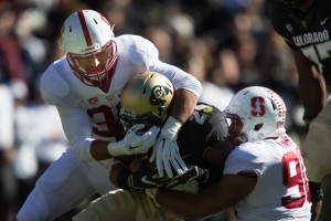 Stanford's defense held the potent Colorado offense to just a 2-of-11 conversion rate on third downs, and as the game wore on, Stanford's defensive front got much better penetration. Junior Mike Tyler (left) and sophomore Solomon Thomas (right) led the team in sacks and tackles for loss, respectively. (DON FERIA/isiphotos.com)