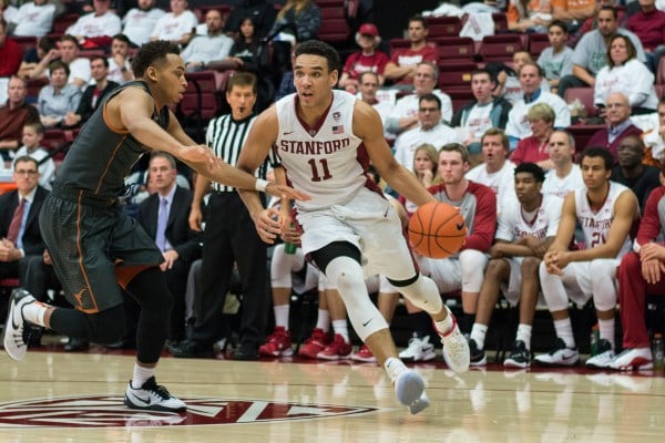 Despite a career day from Dorian Pickens (right) and a late comeback, Stanford fell to Texas off a last-minute layup from Texas' (RAHIM ULLAH/The Stanford Daily)