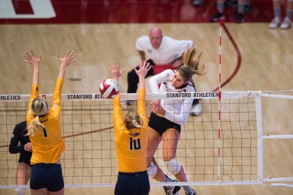 Senior outside hitter Brittany Howard (right) reached a career-high 22 kills in Stanford's victory over UCLA, ending the team's regular season on a five-game win streak. (RAHIM ULLAH/The Stanford Daily)