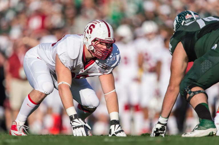 Arizona defensive end Josh Mauro '13 (left) was a standout during his time on The Farm, posting 12.5 tackles for loss and 4 sacks as a fifth-year senior. Mauro had a tackle in the NFC Championship game before leaving with an injury. (JIM SHORIN/stanfordphoto.com)