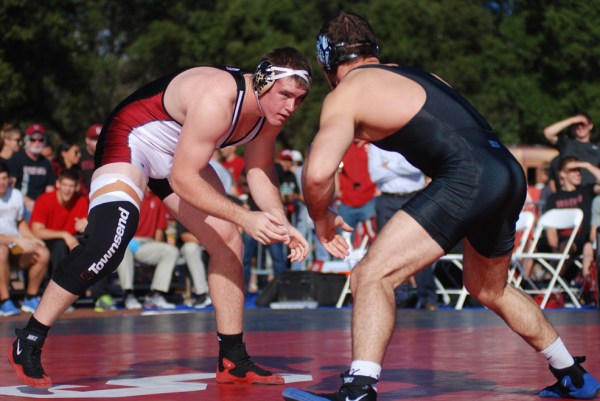 Sophomore Nathan Butler (left) is part of a young core of Cardinal wrestlers supremely confident in their ability to elevate Stanford wrestling to national prominence (RAHIM ULLAH/The Stanford Daily).