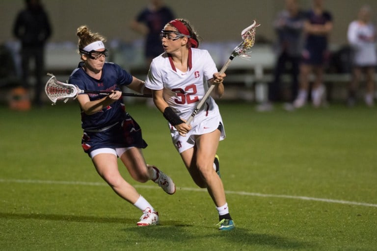 Senior midfield Lucy Dikeou (right) recorded a hat trick the last time Stanford took on Denver. This weekend, the team will face Denver and Colorado on the road. (RAHIM ULLAH/The Stanford Daily)