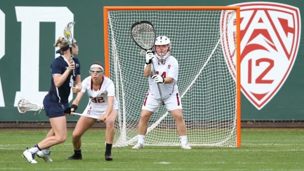 Sophomore goalkeeper Allie DaCar (right) got seven of her 10 saves against Denver in the first half and was helped out by a strong charge from the Stanford offense, which pulled away late with four goals for the 9-5 final margin. (HECTOR GARCIA-MOLINA/stanfordphoto.com)