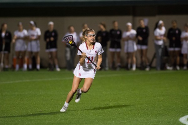 Sophomore Kelly Myers (above) was one of two Cardinal to record a hat trick in last week's game against Colorado. This week, the team hopes to extend its undefeated conference record with a win over Oregon. (RAHIM ULLAH/The Stanford Daily)