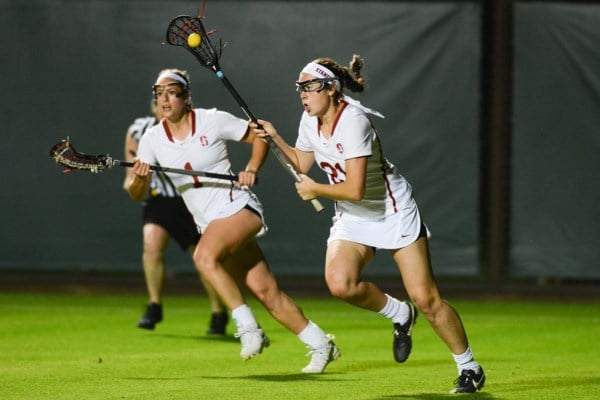 Junior attacker Kelsey Murray (21) and junior attacker Elizabeth Cusick (1)