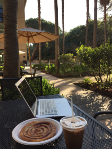 Iced coffee and a cinnamon swirl at the Alumni Café (Samantha Wong/The Stanford Daily) 