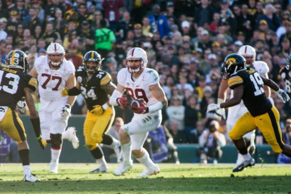 Wide receiver Devon Cajuste (center) used his size to be a solid possession receiver but also had deceptive speed that allowed him to get behind defenses. Stanford hopes sophomore J.J. Arcega-Whiteside can take Cajuste's place. (SAM GIRVIN/The Stanford Daily)