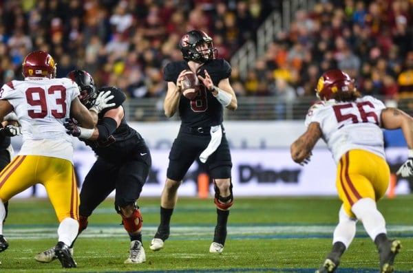 As NFL teams announced their 53-man rosters, fifth-round draft pick Kevin Hogan (center) was cut from the Kansas City Chiefs. The winningest quarterback in Stanford history signed to the Cleveland Browns practice squad on Monday. (SAM GIRVIN/The Stanford Daily)