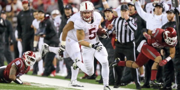 Junior running back Christian McCaffrey flies past Cougar defenders in last year's nail-biter in Pullman. Washington State held the Heisman runner-up to a relatively tame 107 yards rushing during a 30-28 Cardinal victory. (BOB DREBIN/isiphotos.com)