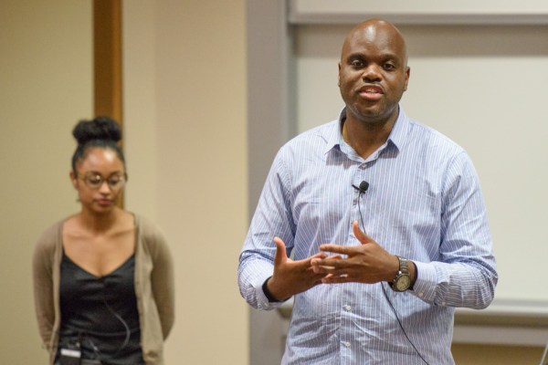 Sean Bogle, right, Associate Director, Office of Community Standards and Celeste Davila,
Office Manager, deliver a request for more faculty to volunteer to serve on judicial panels.
(Courtesy of Linda Cicero/Stanford News)