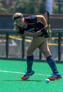 Senior defender Fran Tew prepares her stance and she hits the ball, defending the Cardinal end of the field. Tew has been a force to be reckoned with, and will be a major force as Stanford prepares for the America East Tournament. (NATHAN STAFFA/ The Stanford Daily)