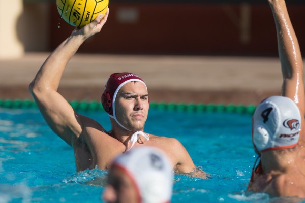 Sophomore Blake Parrish prepares to take a shot past opposing defense. Parrish leads the Cardinal with 36 goals this season, four of which were in a loss against Pacific on Saturday. (RAHIM ULLAH/ The Stanford Daily)