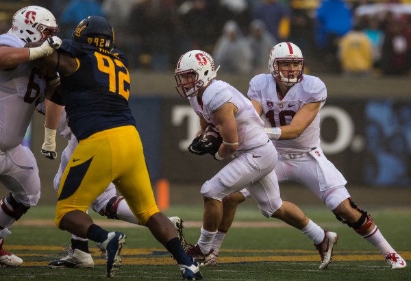 Head coach David Shaw believes junior quarterback Keller Chryst (right) will continue to improve as he finishes the regular season against the Rice Owls. Chryst's play has looked stronger of late, particularly in his last two games. (SYLER PERALTA-RAMOS/The Stanford Daily)