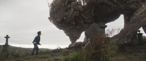 Conor (Lewis MacDougall) confronts the Monster (Liam Neeson) in J.A. Bayona’s drama A MONSTER CALLS. Photo credit : Focus Features.