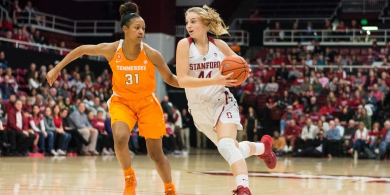 Karlie Samuelson slides past opponents as she drives towards the net. Samuelson, as one of the team's top scorers, will be an essential component as the team prepares to take on Arizona and Arizona State this weekend. (RAHIM ULLAH/The Stanford Daily)