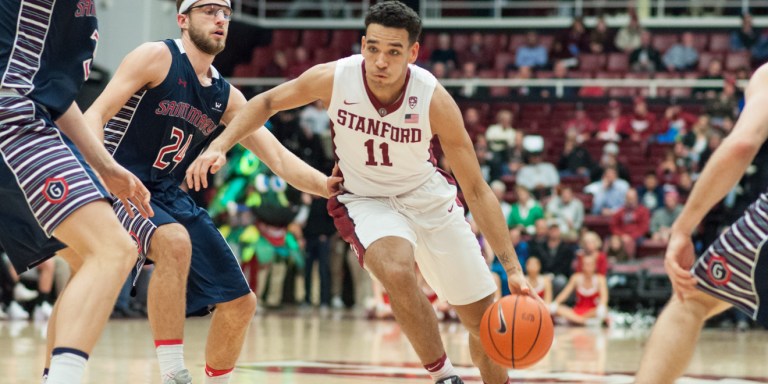 Junior guard Dorian Pickens drives towards the net. Pickens managed to rack up 15 points in Wednesday night's win against Oregon State. (RAHIM ULLAH/The Stanford Daily)