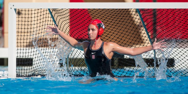 Senior goalkeeper, Gabby Stone, widens her stance so as to protect more of the net. Stone has maintained an impressive 9.6 saves per game, allowing opposing teams to score only 4.0 points per game. (MACIEK GUDRYMOWICZ/courtesy isiphotos.com)