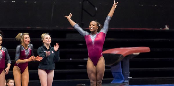 Junior Elizabeth Price finished off the competition on floor, posting a 9.900 to clinch the session-one victory for Stanford. The score placed Price second on floor in the meet. (KAREN HICKEY/isiphotos.com)