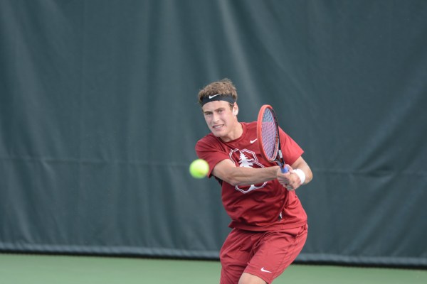 The Cardinal’s 4-3 Big Slam victory came down to the third set of Cardinal sophomore Michael Genender’s matchup against a Cal senior. Genender and his opponent headed into a tiebreaker after exchanging holds of the serve. After intense back-and-forth play, Genender closed out 11-9, ending the most nail-biting match in recent history for the Cardinal in a victory. (MYLAN GRAY/The Stanford Daily)