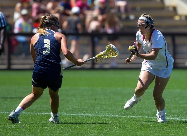 Senior Elizabeth Cusick led the Cardinal offense in Stanford's road trip to the East Coast as she tallied a team-high seven goals. Cusick scored a game-winning goal against Harvard but could not prevent Yale from edging her team (NORBERT VON DER GROEBEN/isiphotos).