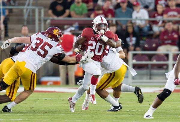 Junior running back Bryce Love (20, above) was a part of a monster rushing attack  last season as the Cardinal rushed for 302 yards against USC in 2016.(DAVID BERNAL/isiphotos.com)