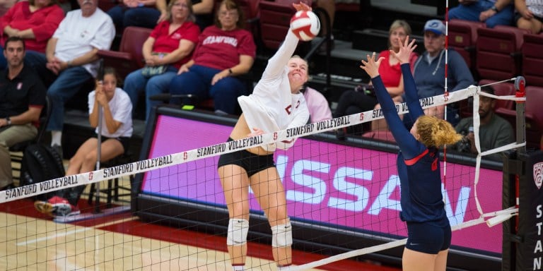 Sophomore outside hitter Kathryn Plummer (left) led Stanford with 12 kills last week against Arizona.(ERIN CHANG/Stanford Athletics)