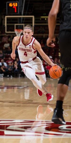 Freshman guard Isaac White (above) scored the second most points by a freshman  in their debut (17). Mark Pitchford '77 scored 28 points as a freshman against Cal Poly.(MIKE RASAY/isiphotos.com)