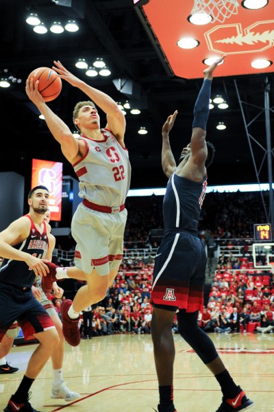 Senior forward Reid Travis (above) notched his seventh double-double of the season Saturday, scoring 20 points and grabbing 10 rebounds. It was not enough to top the Wildcats, however as Arizona came back for a 73-71 victory. (MICHAEL KHEIR/Stanford Daily)