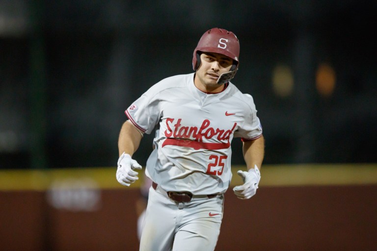 Infielder/outfielder junior Andrew Daschbach (above) drove in a pair of runs in Saturday's 11-5 loss to UCLA. (BOB DREBIN/isiphotos.com)