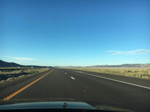 The road somewhere off in north-central Nevada in a spot where there isn't much of anything except for a small town in the rearview mirror (not pictured).