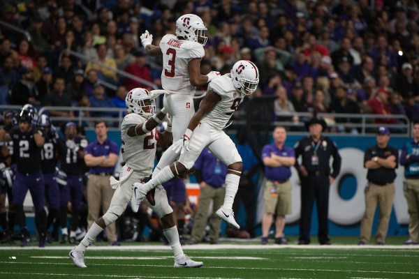 Safety Malik Antoine (center) recorded two interceptions to lead the high-flying Stanford defense past USC in a 17-3 rout.
(DON FERIA/isiphotos.com)