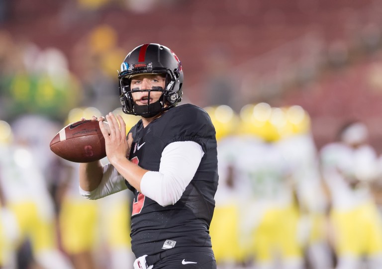 Junior quarterback K.J. Costello (above) threw two interceptions (one returned for a touchdown) and took four sacks in Stanford's 21-40 loss to Utah on Saturday night. Costello's play can be directly attributed to the struggles of the Stanford offensive line. (DAVID BERNAL/isiphotos.com)