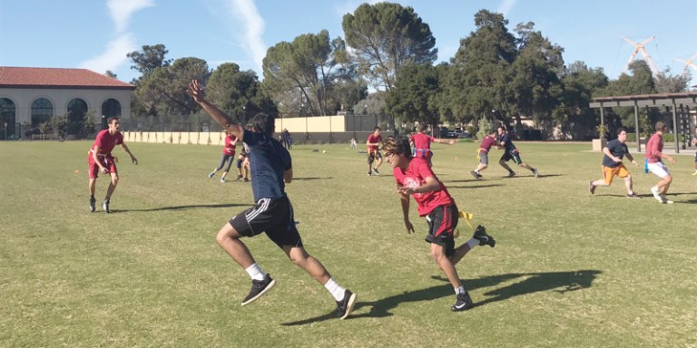 Here's a picture of me (the guy with the frosted tips on the right), running like a man possessed during last year's Ink Bowl. I totally had shut down coverage on that dude I'm following. He definitely didn't burn me. (Courtesy of The Daily Californian)