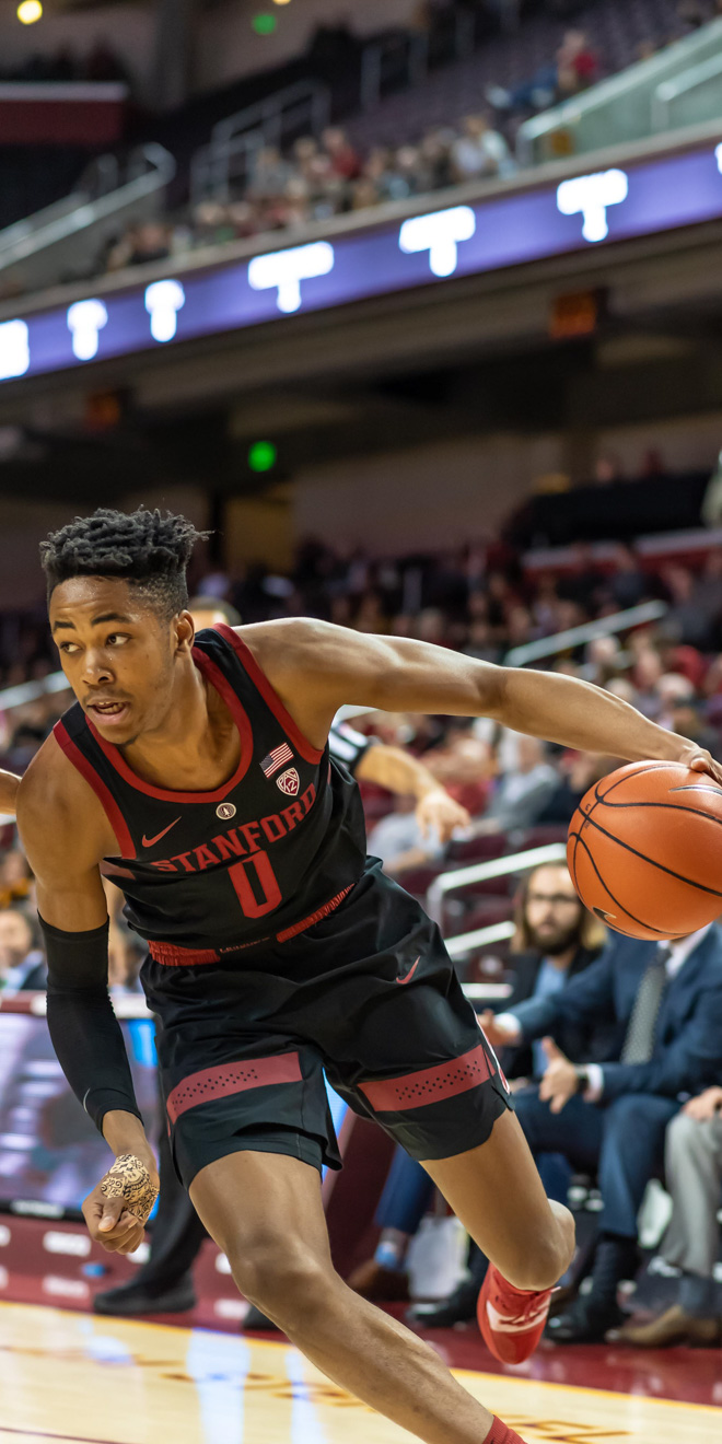 Sophomore forward KZ Okpala drives towards the lane during a non-conference game earlier this season. Okpala showed flashes of brilliance during the Cardinal's first two games of Pac-12 play.