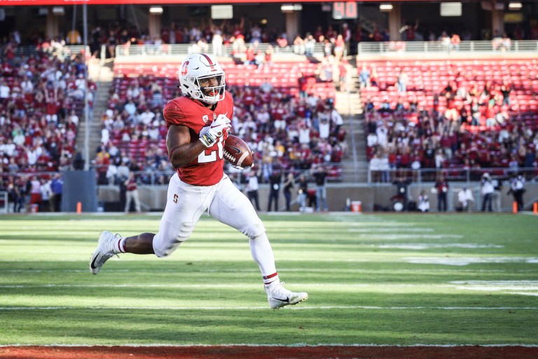 Senior running back Bryce Love (above) was invited to the 2019 Combine, despite tearing his ACL during the final game of his college career. Once thought to be a first round talent, he will now hope to rehab and increase his draft stock over the coming months. (MICHAEL SPENCER/The Stanford Daily)