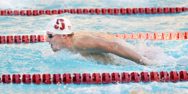 Senior Abrahm Devine (above) claimed two victories in the final home meet of his career, in the 200 IM and the 100 Fly. (HECTOR GARCIA-MOLINA/isiphotos.com)