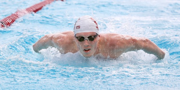 Senior Abrahm DeVine (above) won the 100-yard freestyle and finished second in the 50-yard freestyle in the team's most recent competition against USC on February 9th. The Cardinal face Cal tomorrow in Berkeley. (HECTOR GARCIA-MOLINA/isiphotos.com)