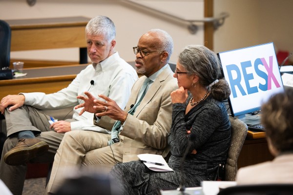 Jim Campbell, left, Harry Elam, and Susie Brubaker-Cole give a presentation on Residential Education.