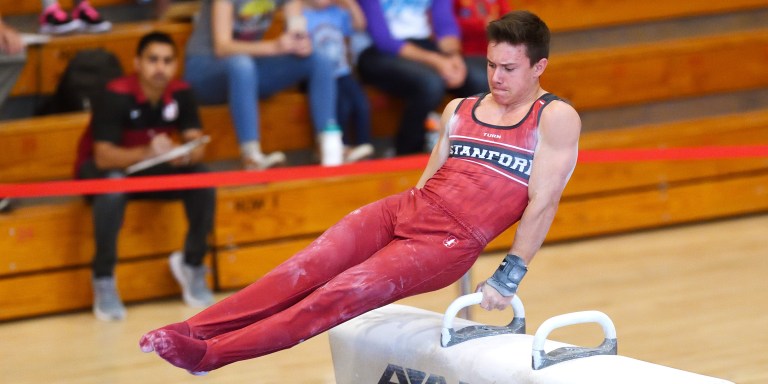 Freshman Brody Malone (above) placed overall in the all-around title with a score of 84.050 as Stanford qualified for the NCAAs. Malone was named  College Gymnastics Association Rookie of the Week for the fifth time this year, and also earned MPSF Gymnast of the Year honors. (HECTOR GARCIA-MOLINA)