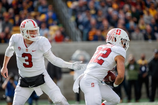 The ability of quarterback KJ Costello (left) and running back Cameron Scarlett (right) to put early offensive pressure on Northwestern will be paramount to Stanford's success. (BOB DREBIN/isiphotos.com)