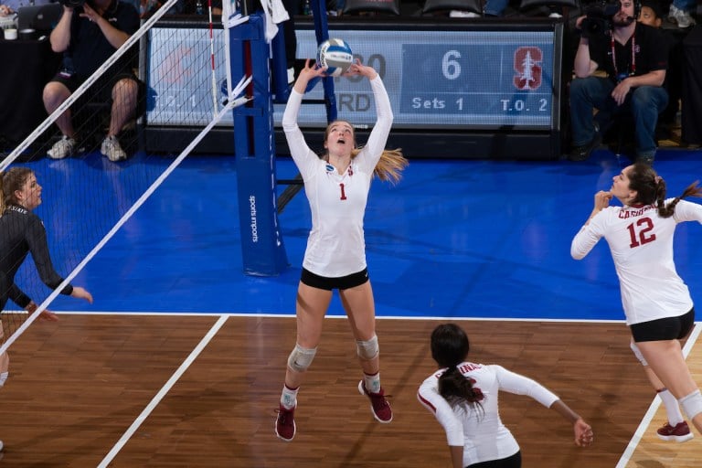 Senior setter Jenna Gray (#1 above) put away the game point against Duke in the third and final game of the College of Charleston Classic. Gray totalled 32 assists, seven digs, four kills and four blocks in the Saturday match-up. (MIKE RASAY/isiphotos.com)