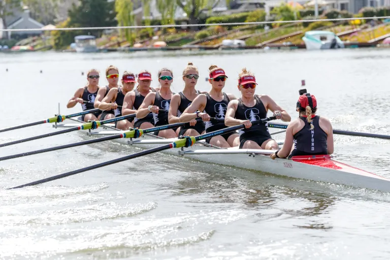 Stanford women's rowing team rowing on the Charles River